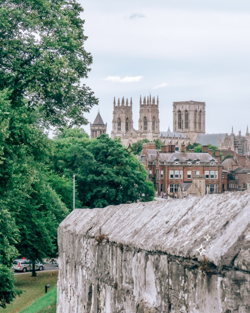 York's Medieval city wall, with trees and the York Minster in the background